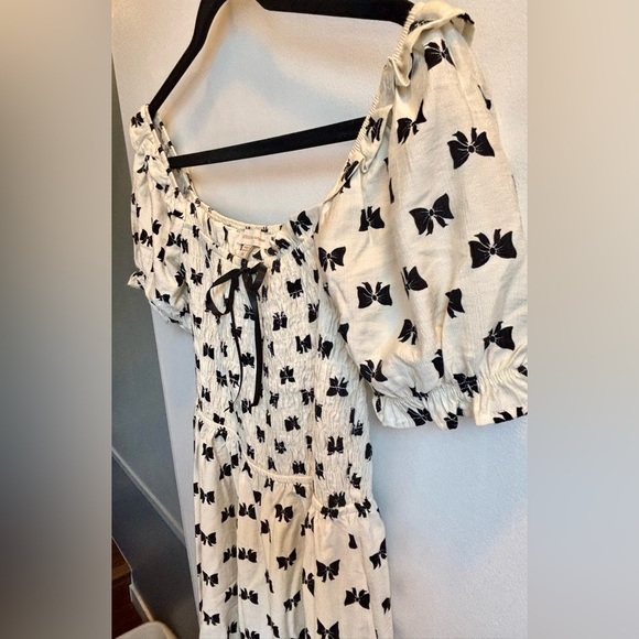 Cream Ruffled Off-Shoulder Dress with Black Bow Design - Picture 3 of 7